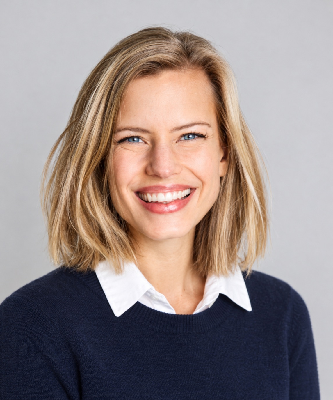 Example tutor portrait of Sarah M.: head and shoulders, against a plain pale background